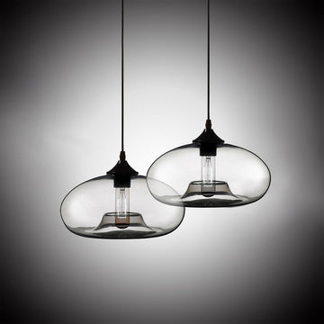 Modern Style Clear Glass Single-Light Concave Oval Pendant Lamp Fixture with Adjustable Cable Incandescent Bulb Included